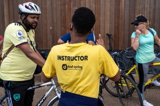 Deaf Cycling instructor with cyclists