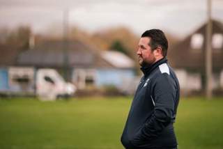 Be Wiser's Michael Cunningham who founded Kick Start FC pictured on the sidelines at a training game
