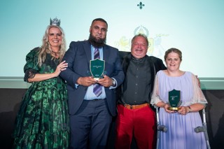 Kelly Ann Knight and Derek Coles stood with ACT Spotlight Awards winners, Kam and Helen