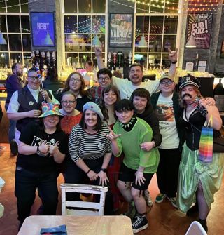 Perth Parrots social group wearing outfits for a Eurovision party