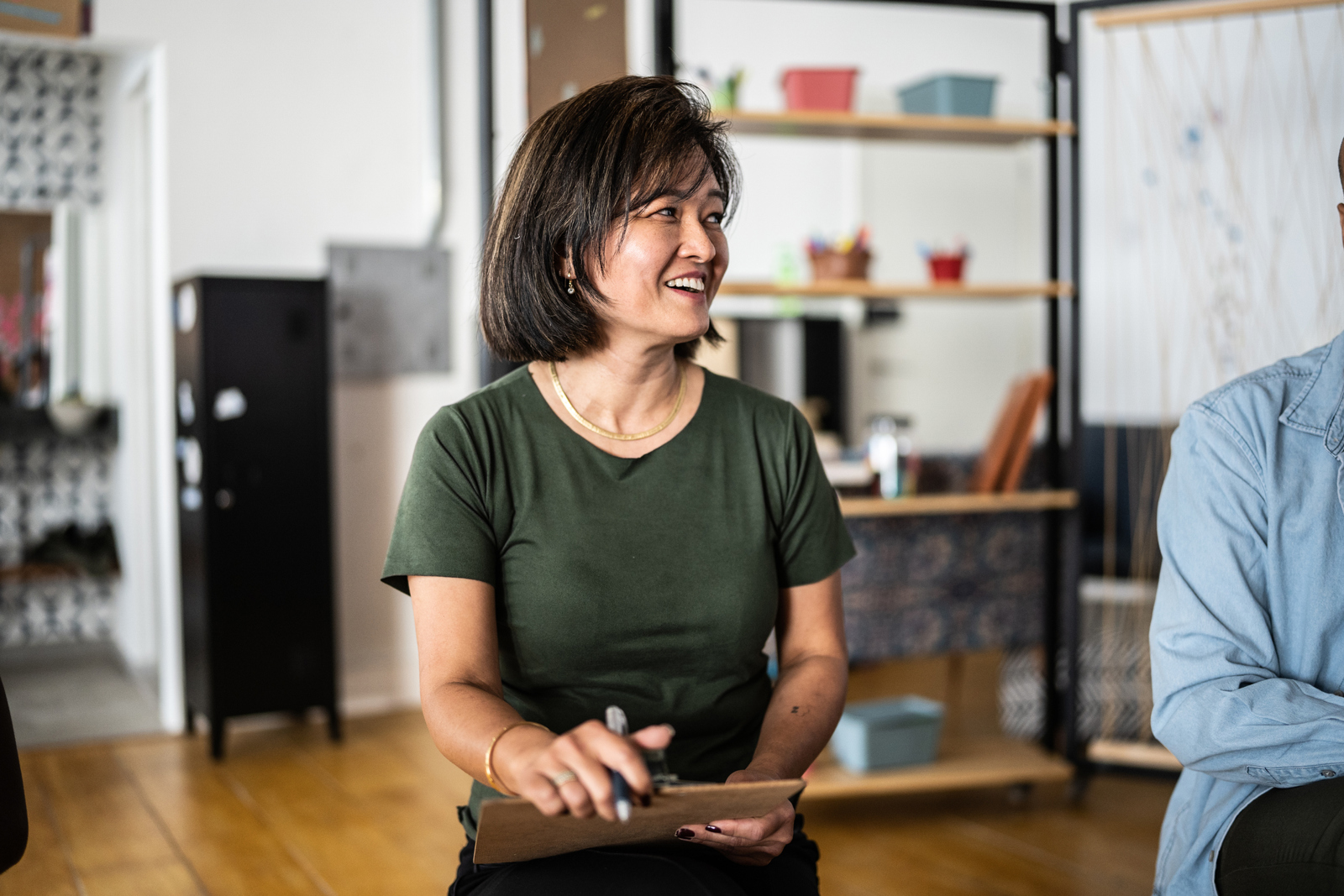 Woman checking clipboard 