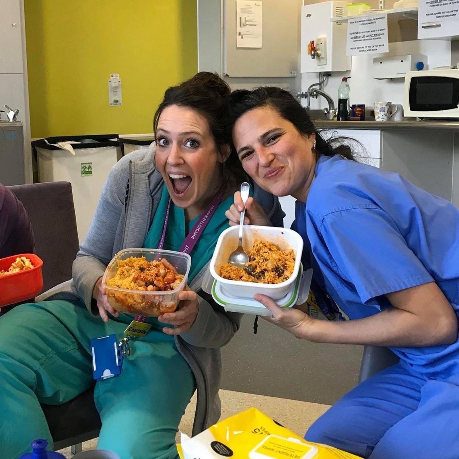 Two Doctors Eating meals from Hospitality For Heroes 