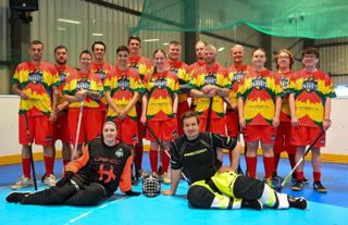 Perth Parrots the LGBTQ+ floorball team in Scotland pose for a team shot