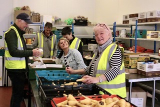 Volunteers sorting food donations at Shrewsbury Food Hub